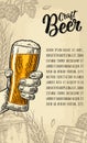 Male hand holding beer glass. Craft Beer calligraphic lettering