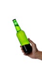 Male hand holding brown beer bottle Royalty Free Stock Photo