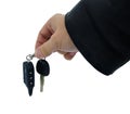 Male hand holding car key and alarm system charm Royalty Free Stock Photo