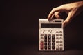 Male Hand Holding a Electronic Calculator Royalty Free Stock Photo