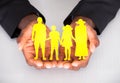 Male Hand Holding Family Cutout Shape Royalty Free Stock Photo