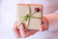 Male hand holding gift box. Royalty Free Stock Photo
