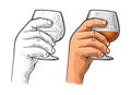 Male hand holding glass brandy. Vintage vector engraving Royalty Free Stock Photo