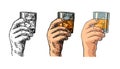 Male hand holding a glass with whiskey and ice cubes. Royalty Free Stock Photo