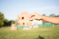 Male hand holding house keys Royalty Free Stock Photo