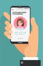 Male hand holding mobile phones with dating app profile on display.Concept on online dating application.Pretty young woman account Royalty Free Stock Photo