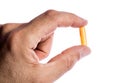 Male Hand Holding Pill Royalty Free Stock Photo