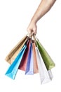 Male hand holding shopping bags isolated on white Royalty Free Stock Photo