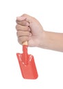 Male hand holding a shovel