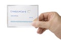 Male hand holding transparent credit card