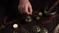 Male hand holds a bronze ritual bell for prayers and meditations