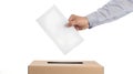 Hand placing paper in a ballot box, concept of voting. Simple and clear election process image. Male voter, democratic