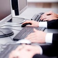 Male hand on keyboard typing and scroll mouse Royalty Free Stock Photo