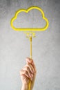 Male hand with LAN cable connected to cloud service Royalty Free Stock Photo