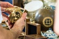 Male hand looking for an old compass at a retro - vintage street market in Split, Croatia Royalty Free Stock Photo