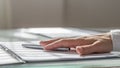 Male hand lying on a contract or document and a pen Royalty Free Stock Photo