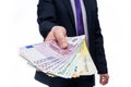 Male hand offering euro banknotes close up Royalty Free Stock Photo