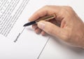 Male hand with pen over document closeup, space for signature. Contract signing concept Royalty Free Stock Photo