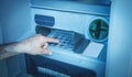 Male hand pressing on ATM machine keypad Royalty Free Stock Photo