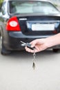 Male hand pressing on the remote control car alarm systems Royalty Free Stock Photo