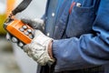 Male hand push remote control switch for overhead crane in the factory, close-up. Electrical control panel of the crane Royalty Free Stock Photo