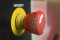 Male hand pushing emergency stop red button Royalty Free Stock Photo