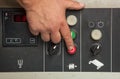 Male hand pushing red stop button. Royalty Free Stock Photo