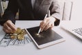 Male hand putting coins with money stack step growing growth and dollar bag. saving money, Concept finance business investment Royalty Free Stock Photo