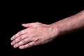 Male hand reaching or pointing down. Royalty Free Stock Photo