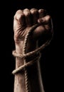 Male hand with rope. Conception aggression Royalty Free Stock Photo