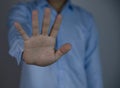 male hand showing stop gesture Concept of stop violence. Royalty Free Stock Photo