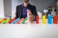 Male Hand Stopping The Domino From Falling Royalty Free Stock Photo