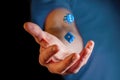 Male hand throwing blue dice cubes in the air. Royalty Free Stock Photo