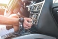 Male hand on transmission gear inside car. Close view of male hand with car interior Royalty Free Stock Photo