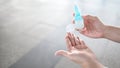 Male hand using hand sanitizer gel washing hand