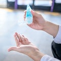 Male hand using hand sanitizer gel washing hand