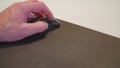 male hand using mouse on mousepad