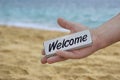 Male Hand with WELCOME signboard Royalty Free Stock Photo