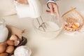 Male hands beating egg whites cream with mixer in the bowl Royalty Free Stock Photo