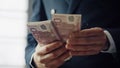 Male hands calculating bills european currency close up. Man counting banknotes. Royalty Free Stock Photo