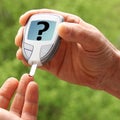 Male hands closeup, a man does a nature test with a glucometer, medical concept, blood glucose control, diabetes