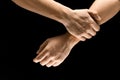 Male hands demonstrating a gesture of getting touch isolated on gray background