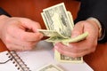 Male hands hold dollars Royalty Free Stock Photo