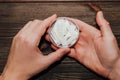 Male hands hold in hand a box of snus with nicotine spiders. Royalty Free Stock Photo