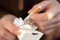 Male hands hold a pack of cigarettes, closeup view. Royalty Free Stock Photo