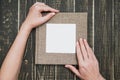 Male hands holding brown canvas photo book