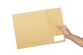 Male hands holding brown envelope Royalty Free Stock Photo