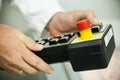 Pushing the button on the control panel Royalty Free Stock Photo