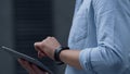 Male hands holding digital tablet computer close up. Manager working online. Royalty Free Stock Photo