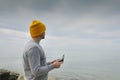 Male hands holding dron remote controller doing some setings ready to run it into the sky Royalty Free Stock Photo